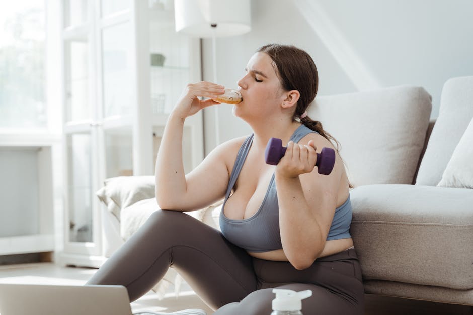 Confident plus-size woman enjoying donut while exercising at home.